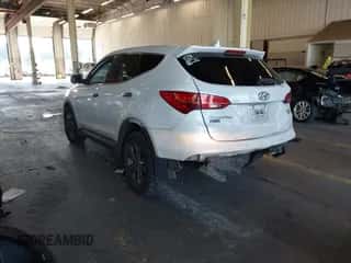 2015 Hyundai Santa Fe z VIN 5XYZTDLB4FG294735, wystawiony jako IAAI lot #43230960 z przebiegiem 169 342 mil mil oraz . Historia ofert i sprzedaży dostępna na DreamBid. Obrazek 3.