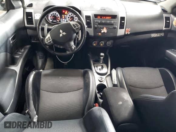 2012 Mitsubishi Outlander SE с VIN JA4JT3AW7CU010189, выставлен на аукционе Copart как лот 86705115 с пробегом 159 671 миль миль и Чистый • Clean title. История ставок и продаж доступна на DreamBid. Изображение 8.