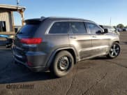 ✅ 2014 Jeep Grand Cherokee Overland • VIN: 1C4RJFCG4EC340001 • Lot: 90811455. Listed on Copart with 154,880 mi. Free auction sales archive from the USA and detailed vehicle history report at DreamBid. Image 3.