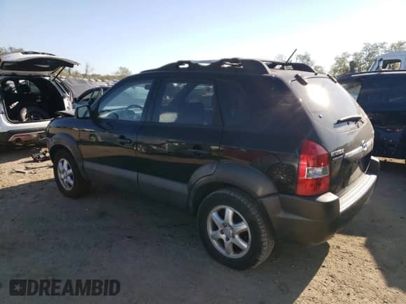 2005 Hyundai Tucson GLS z VIN KM8JN12D45U065618, wystawiony jako Copart lot #77370754 z przebiegiem 87 525 mil mil oraz Szkoda całkowita • Salvage title. Historia ofert i sprzedaży dostępna na DreamBid. Obrazek 2.