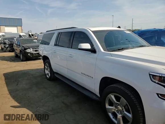 ✅ 2015 Chevrolet Suburban LT • VIN: 1GNSKJKC7FR191055 • Lot: 74017974. Wystawiony na Copart z przebiegiem 101 556 mil. Bezpłatny archiwum sprzedaży aukcyjnych z USA i szczegółowy raport historii pojazdu na DreamBid. Zdjęcie 12.