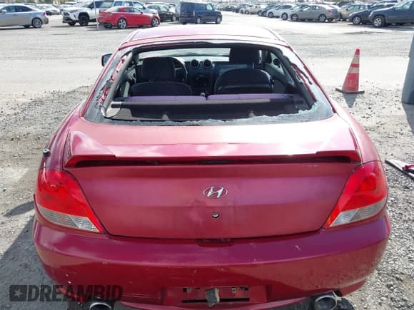 ✅ 2005 Hyundai Tiburon GS • VIN: KMHHM65D45U183100 • Лот: 43627934. Опубликован ранее на IAAI с пробегом 130 401 миль. Бесплатный доступ к архиву аукционных продаж из США и подробный отчёт об истории автомобиля на DreamBid. Изображение 16.