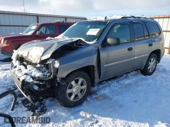 ✅ 2007 GMC Envoy SLT • VIN: 1GKDT13S072122985 • Lot: 41512818. Listed on IAAI with 139,289 mi. Free auction sales archive from the USA and detailed vehicle history report at DreamBid. Image 2.