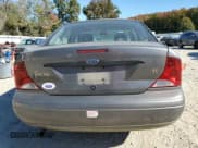 ✅ 2003 Ford Focus SE • VIN: 1FAFP34313W293846 • Lot: 78299994. Listed on Copart with 110,311 mi. Free auction sales archive from the USA and detailed vehicle history report at DreamBid. Image 6.