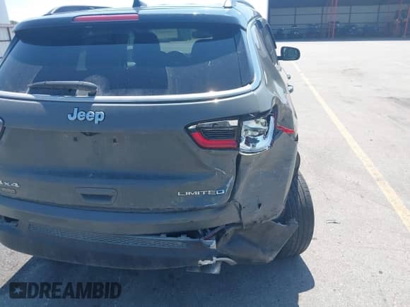 2021 Jeep Compass Limited with VIN 3C4NJDCBXMT596279, listed as a IAAI auction lot 42982613 with 52,886 mi miles and . Bid and sale history available at DreamBid. Image 6.