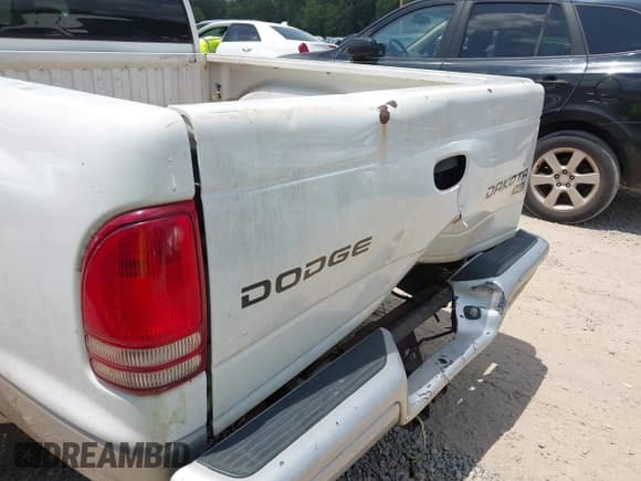 ✅ 2003 Dodge Dakota SLT • VIN: 1D7HL48X63S144573 • Lot: 42798150. Wystawiony na IAAI z przebiegiem 224 361 mil. Bezpłatny archiwum sprzedaży aukcyjnych z USA i szczegółowy raport historii pojazdu na DreamBid. Zdjęcie 12.