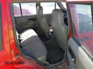 ✅ 1996 Jeep Cherokee Sport • VIN: 1J4FT68S0TL225719 • Lot: 42121351. Listed on IAAI with 237,602 mi. Free auction sales archive from the USA and detailed vehicle history report at DreamBid. Image 8.