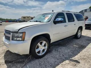 ✅ 2012 Chevrolet Suburban LTZ • VIN: 1GNSKKE7XCR106323 • Lot: 60630435. Listed on Copart with 172,978 mi. Free auction sales archive from the USA and detailed vehicle history report at DreamBid. Image 1.