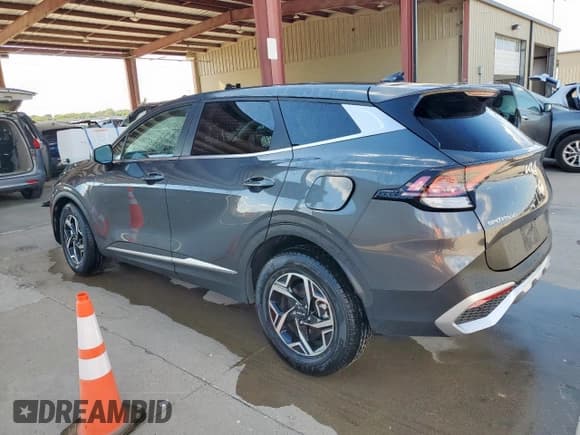 ✅ 2023 Kia Sportage LX • VIN: KNDPU3AF5P7165924 • Lot: 85330515. Wystawiony na Copart z przebiegiem 91 096 mil. Bezpłatny archiwum sprzedaży aukcyjnych z USA i szczegółowy raport historii pojazdu na DreamBid. Zdjęcie 2.