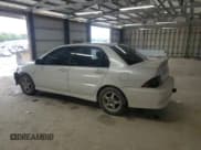 ✅ 2002 Mitsubishi Lancer OZ-Rally • VIN: JA3AJ86E02U071034 • Lot: 57222945. Listed on Copart with 159,193 mi. Free auction sales archive from the USA and detailed vehicle history report at DreamBid. Image 2.