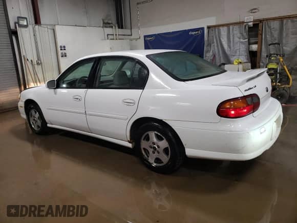 2003 Chevrolet Malibu LS with VIN 1G1NE52J93M548014, listed as a Copart auction lot 85445814 with 114,160 mi miles and Salvage title. Bid and sale history available at DreamBid. Image 2.