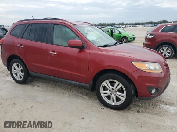 ✅ 2011 Hyundai Santa Fe Limited • VIN: 5XYZKDAG8BG045334 • Lot: 79419674. Listed on Copart with 157,770 mi. Free auction sales archive from the USA and detailed vehicle history report at DreamBid. Image 4.