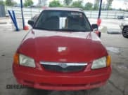 ✅ 1999 Mazda Protege DX • VIN: JM1BJ222XX0118051 • Lot: 57821805. Wystawiony na Copart z przebiegiem 299 504 mil. Bezpłatny archiwum sprzedaży aukcyjnych z USA i szczegółowy raport historii pojazdu na DreamBid. Zdjęcie 5.