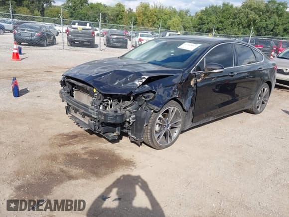 ✅ 2019 Ford Fusion Titanium • VIN: 3FA6P0D95KR187128 • Лот: 43262017. Опубликован ранее на IAAI с пробегом 133 379 миль. Бесплатный доступ к архиву аукционных продаж из США и подробный отчёт об истории автомобиля на DreamBid. Изображение 2.