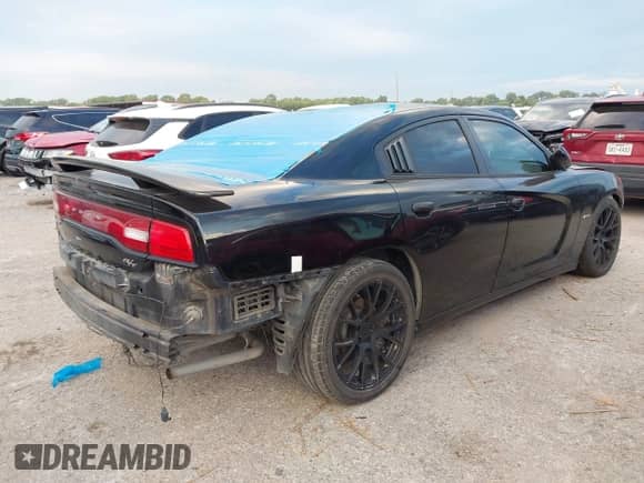 ✅ 2013 Dodge Charger RT • VIN: 2C3CDXCT6DH612970 • Lot: 43328761. Wystawiony na IAAI z przebiegiem 124 816 mil. Bezpłatny archiwum sprzedaży aukcyjnych z USA i szczegółowy raport historii pojazdu na DreamBid. Zdjęcie 4.