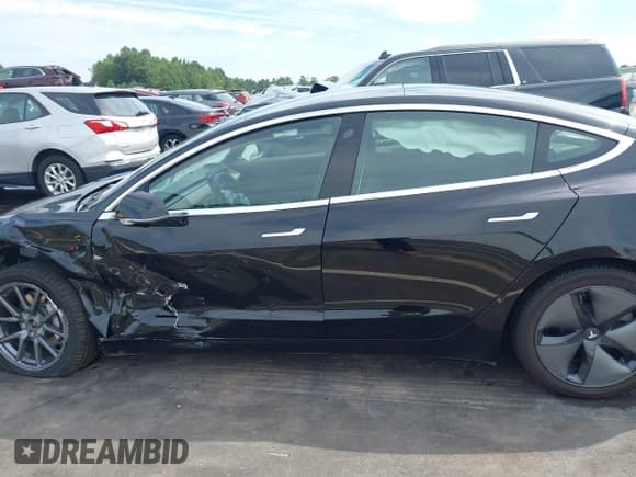 ✅ 2019 Tesla Model 3 Long Range • VIN: 5YJ3E1EB7KF191225 • Lot: 43083514. Listed on IAAI with 87,376 mi. Free auction sales archive from the USA and detailed vehicle history report at DreamBid. Image 14.