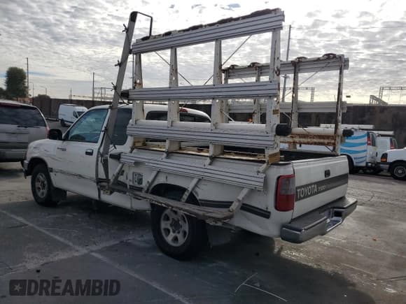 ✅ 1998 Toyota T100 SR5 • VIN: JT4TN14D6W0040562 • Лот: 81951875. Опубликован ранее на Copart с пробегом 203 764 миль. Бесплатный доступ к архиву аукционных продаж из США и подробный отчёт об истории автомобиля на DreamBid. Изображение 2.