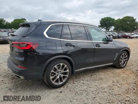 ✅ 2021 BMW X5 xDrive45e • VIN: 5UXTA6C04M9H58063 • Lot: 53128655. Listed on Copart with 56,558 mi. Free auction sales archive from the USA and detailed vehicle history report at DreamBid. Image 3.