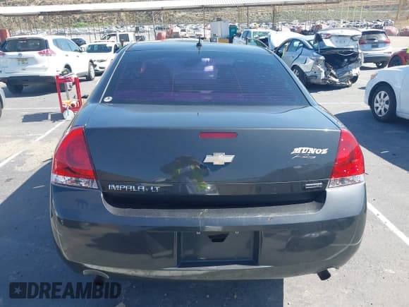 ✅ 2014 Chevrolet Impala LT • VIN: 2G1WB5E32E1138096 • Lot: 42324973. Listed on IAAI with 143,369 mi. Free auction sales archive from the USA and detailed vehicle history report at DreamBid. Image 17.
