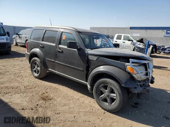 2008 Dodge Nitro SXT с VIN 1D8GU28K58W219907, выставлен на аукционе Copart как лот 77009104 с пробегом Не указан миль и Списание • Salvage title. История ставок и продаж доступна на DreamBid. Изображение 4.