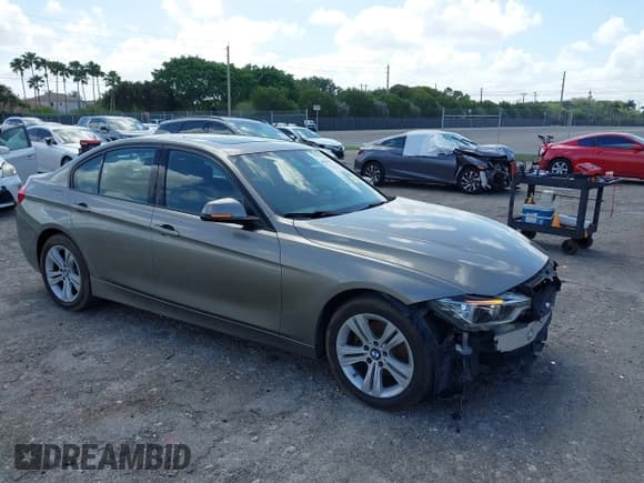 ✅ 2016 BMW 3 Series 328i xDrive • VIN: WBA8E3G5XGNU05817 • Lot: 41942151. Listed on IAAI with 115,637 mi. Free auction sales archive from the USA and detailed vehicle history report at DreamBid. Image 1.