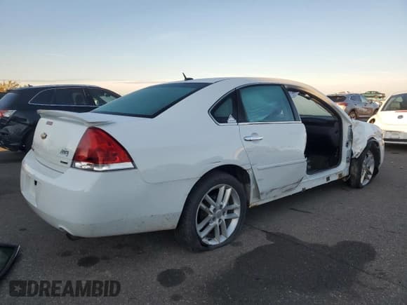 ✅ 2014 Chevrolet Impala LTZ • VIN: 2G1WC5E39E1152302 • Lot: 86253965. Listed on Copart with 121,662 mi. Free auction sales archive from the USA and detailed vehicle history report at DreamBid. Image 3.