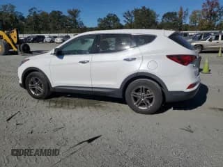 ✅ 2018 Hyundai Santa Fe 2.4L • VIN: 5NMZT3LB9JH086276 • Лот: 86597905. Опубликован ранее на Copart с пробегом 130 862 миль. Бесплатный доступ к архиву аукционных продаж из США и подробный отчёт об истории автомобиля на DreamBid. Изображение 2.