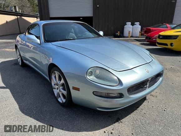 ✅ 2004 Maserati Coupe • VIN: ZAMBC38A240012148 • Lot: 55220585. Wystawiony na Copart z przebiegiem 87 977 mil. Bezpłatny archiwum sprzedaży aukcyjnych z USA i szczegółowy raport historii pojazdu na DreamBid. Zdjęcie 1.
