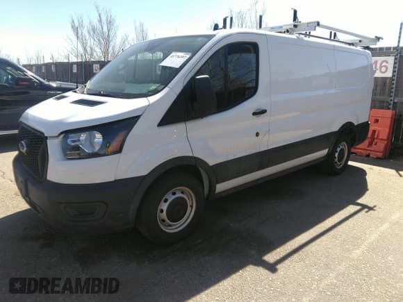 ✅ 2021 Ford Transit Cargo • VIN: 1FTYE1Y83MKA35310 • Lot: 41776397. Listed on IAAI with 65,336 mi. Free auction sales archive from the USA and detailed vehicle history report at DreamBid. Image 2.