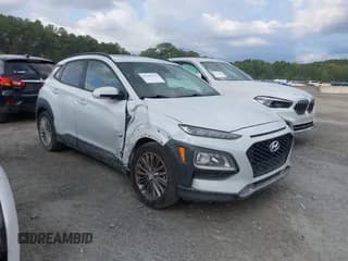 ✅ 2019 Hyundai Kona SEL • VIN: KM8K62AA8KU370906 • Лот: 43106139. Опубликован ранее на IAAI с пробегом 108 758 миль. Бесплатный доступ к архиву аукционных продаж из США и подробный отчёт об истории автомобиля на DreamBid. Изображение 1.