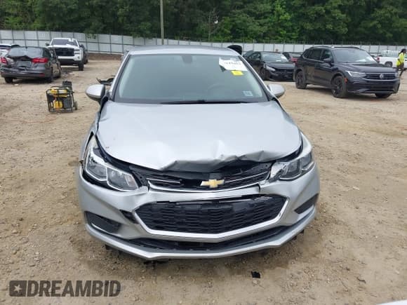 ✅ 2018 Chevrolet Cruze LS • VIN: 1G1BC5SM5J7214433 • Lot: 42616404. Listed on IAAI with 171,129 mi. Free auction sales archive from the USA and detailed vehicle history report at DreamBid. Image 6.
