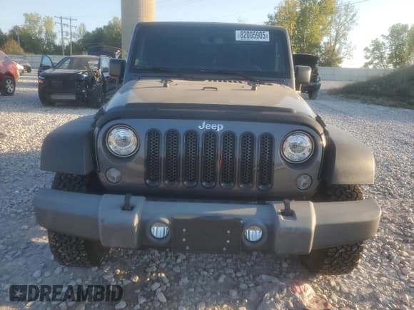 ✅ 2017 Jeep Wrangler Sport • VIN: 1C4GJWAG0HL607259 • Лот: 82005905. Опубликован ранее на Copart с пробегом 57 496 миль. Бесплатный доступ к архиву аукционных продаж из США и подробный отчёт об истории автомобиля на DreamBid. Изображение 5.