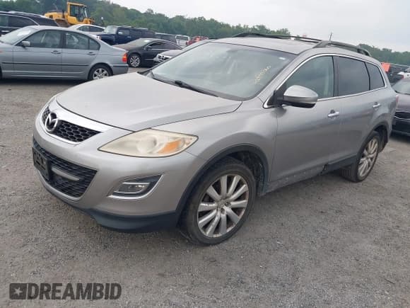 ✅ 2010 Mazda CX-9 Touring • VIN: JM3TB3MV9A0210975 • Lot: 42935060. Listed on IAAI with 180,993 mi. Free auction sales archive from the USA and detailed vehicle history report at DreamBid. Image 2.