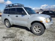 ✅ 2001 Mitsubishi Montero XLS • VIN: JA4MW31R81J022686 • Лот: 86406295. Опубликован ранее на Copart с пробегом 210 220 миль. Бесплатный доступ к архиву аукционных продаж из США и подробный отчёт об истории автомобиля на DreamBid. Изображение 4.