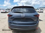 ✅ 2021 Mazda CX-5 Carbon Edition • VIN: JM3KFACM1M0395301 • Lot: 68020185. Wystawiony na Copart z przebiegiem 48 623 mil. Bezpłatny archiwum sprzedaży aukcyjnych z USA i szczegółowy raport historii pojazdu na DreamBid. Zdjęcie 6.