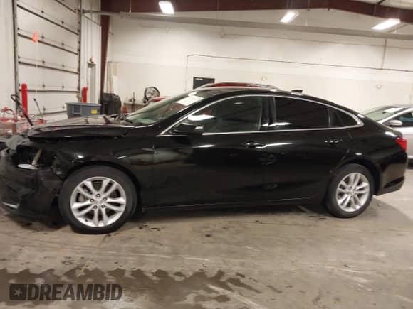 2018 Chevrolet Malibu LT z VIN 1G1ZD5ST4JF263938, wystawiony jako IAAI lot #43378625 z przebiegiem 90 540 mil mil oraz . Historia ofert i sprzedaży dostępna na DreamBid. Obrazek 14.