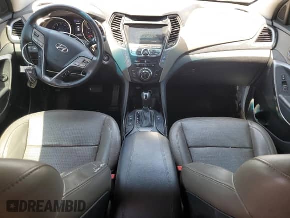 2014 Hyundai Santa Fe z VIN 5XYZW3LA2EG170485, wystawiony jako Copart lot #64200015 z przebiegiem 152 769 mil mil oraz Szkoda całkowita • Salvage title. Historia ofert i sprzedaży dostępna na DreamBid. Obrazek 8.