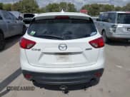 ✅ 2016 Mazda CX-5 Touring • VIN: JM3KE2CY0G0694939 • Lot: 43401057. Wystawiony na IAAI z przebiegiem 125 867 mil. Bezpłatny archiwum sprzedaży aukcyjnych z USA i szczegółowy raport historii pojazdu na DreamBid. Zdjęcie 16.