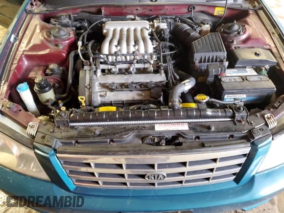 ✅ 2002 Kia Optima LX • VIN: KNAGD128925099335 • Lot: 44184335. Listed on Copart with 112,973 mi. Free auction sales archive from the USA and detailed vehicle history report at DreamBid. Image 11.