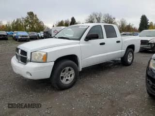 ✅ 2006 Dodge Dakota SLT • VIN: 1D7HW48N66S715103 • Lot: 90688475. Listed on Copart with 116,859 mi. Free auction sales archive from the USA and detailed vehicle history report at DreamBid. Image 1.