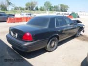 ✅ 2006 Ford Police Interceptor • VIN: 2FAFP71W66X115574 • Lot: 42404631. Listed on IAAI with Not provided. Free auction sales archive from the USA and detailed vehicle history report at DreamBid. Image 4.
