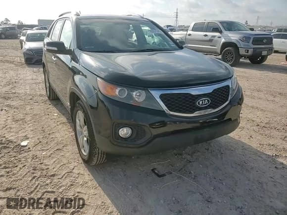 ✅ 2013 Kia Sorento EX • VIN: 5XYKUDA6XDG384182 • Lot: 56957045. Listed on Copart with 154,873 mi. Free auction sales archive from the USA and detailed vehicle history report at DreamBid. Image 14.