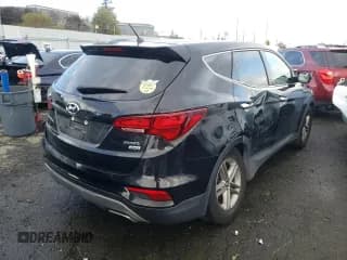 ✅ 2018 Hyundai Santa Fe 2.4L • VIN: 5XYZTDLB5JG548669 • Лот: 40920463. Опубликован ранее на Copart с пробегом 82 354 миль. Бесплатный доступ к архиву аукционных продаж из США и подробный отчёт об истории автомобиля на DreamBid. Изображение 3.
