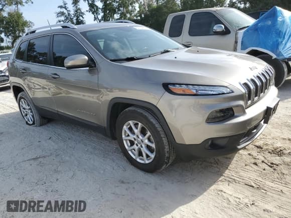 ✅ 2016 Jeep Cherokee Latitude • VIN: 1C4PJMCB8GW296554 • Lot: 84764875. Listed on Copart with 64,170 mi. Free auction sales archive from the USA and detailed vehicle history report at DreamBid. Image 4.