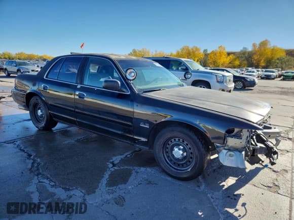✅ 2001 Ford Crown Victoria Police Interceptor • VIN: 2FAFP71W81X138847 • Lot: 87250165. Listed on Copart with 146,907 mi. Free auction sales archive from the USA and detailed vehicle history report at DreamBid. Image 4.