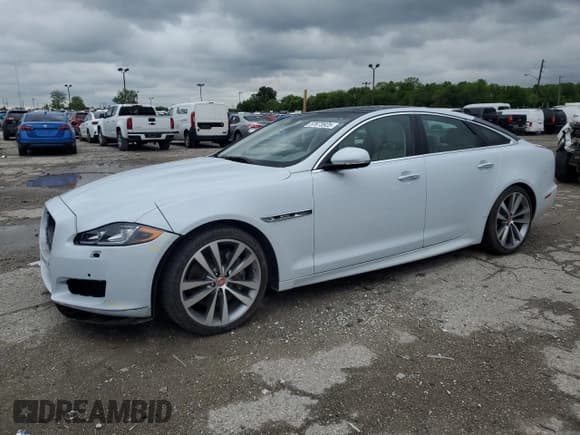 ✅ 2016 Jaguar XJ R-Sport • VIN: SAJWJ1CD1G8W01152 • Lot: 57673925. Listed on Copart with 23,950 mi. Free auction sales archive from the USA and detailed vehicle history report at DreamBid. Image 1.