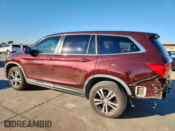 ✅ 2017 Honda Pilot EX-L • VIN: 5FNYF5H50HB017747 • Lot: 91164115. Listed on Copart with 112,463 mi. Free auction sales archive from the USA and detailed vehicle history report at DreamBid. Image 2.