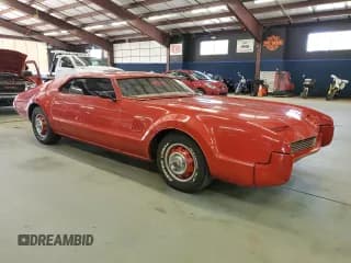 ✅ 1966 Oldsmobile Toronado • VIN: 396876M510997 • Лот: 81609115. Опубликован ранее на Copart с пробегом 47 455 миль. Бесплатный доступ к архиву аукционных продаж из США и подробный отчёт об истории автомобиля на DreamBid. Изображение 4.