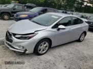 ✅ 2018 Chevrolet Cruze LT • VIN: 1G1BE5SM0J7238116 • Lot: 61329763. Listed on Copart with 74,507 mi. Free auction sales archive from the USA and detailed vehicle history report at DreamBid. Image 1.