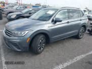 ✅ 2023 Volkswagen Tiguan S • VIN: 3VVRB7AX3PM028664 • Lot: 43412161. Listed on IAAI with 23,124 mi. Free auction sales archive from the USA and detailed vehicle history report at DreamBid. Image 2.